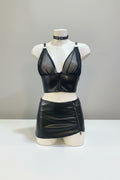 Crop top en faux cuir noir et tulle, zip en strass