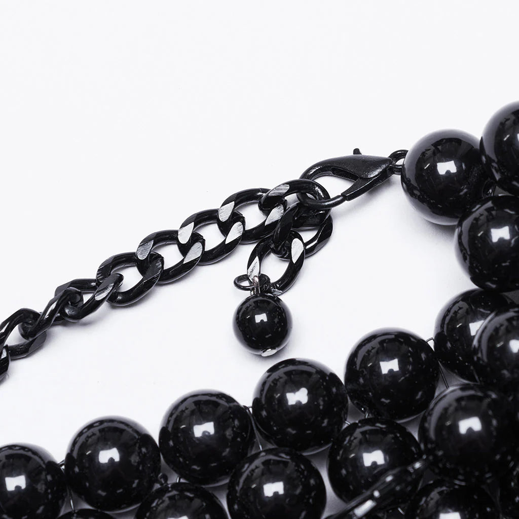 Accessoire de cou gothique avec crâne et perles noir