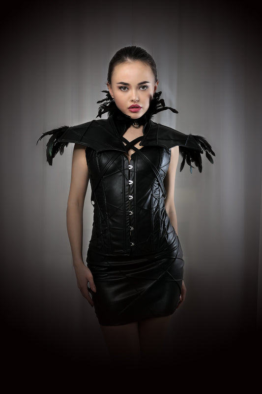 Boléro plume relief